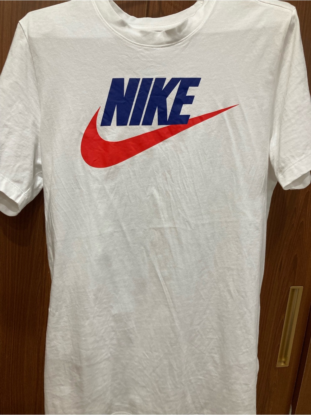 Nike White Short Sleeve Tee with Blue Logo and Red Swoosh